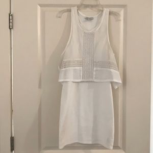 Off white fitted white dress.